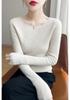 Round Neck Loose Fit Sweater with Seamless Knitting Technology - Comfortable and Slimming Design.