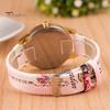 Orologio da polso da donna al quarzo con quadrante rotondo intarsiato di strass a forma di fiore e cinturino in ecopelle