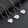Elegant Gold Titanium Steel Women's Necklace with White Shell, Zircon, and Monogram Tassel