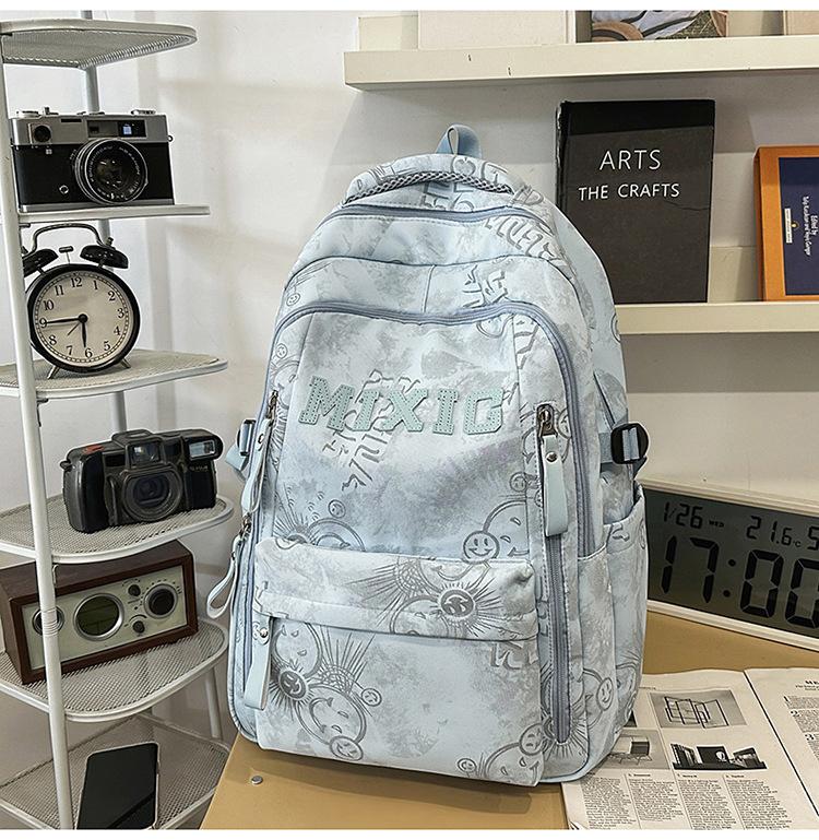 Schoolbag trendy school bag male high school student female graffiti junior high school student backpack college student large capacity lightweight