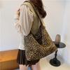 Leopard Print Women's Canvas Tote Bag - Large Capacity Crossbody Shoulder Handbag for Commuting.