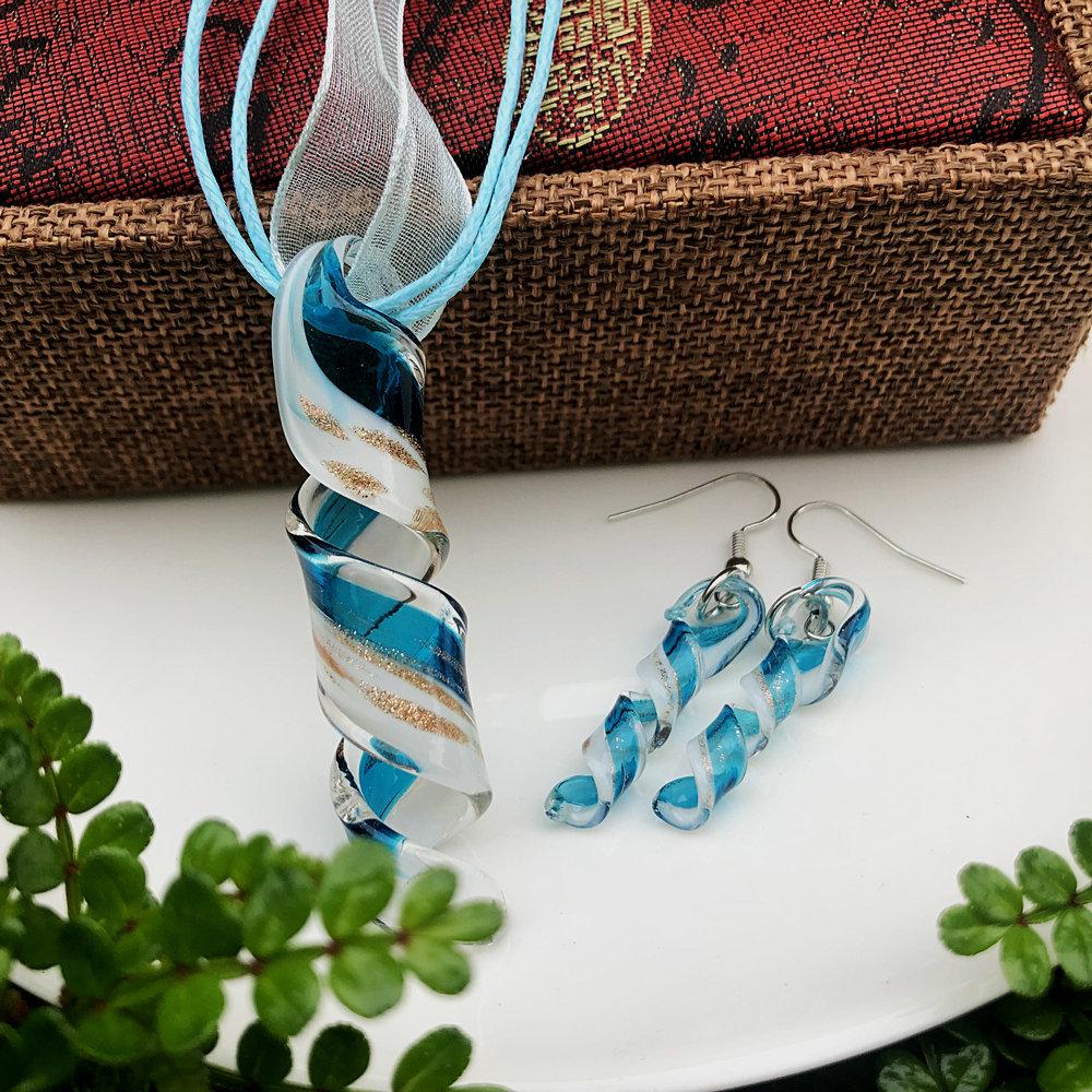 Trendy Blue Glass Ribbon Pendant Necklace & Earring Set - Perfect Seaside Vacation Accessory.