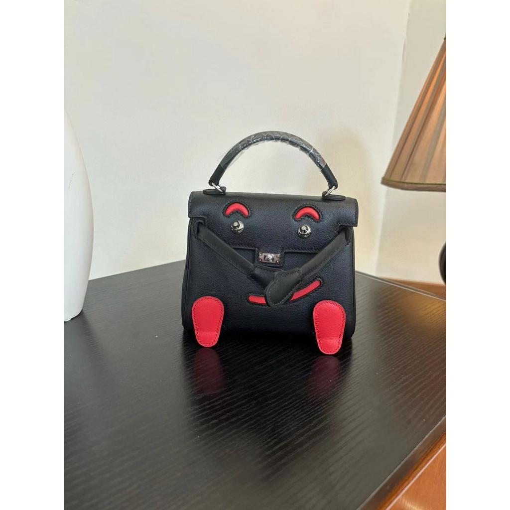 Borsa a faccina sorridente nuova per la primavera e l'estate 2025 borsa Kelli mini in pelle bovina di primo strato di alta gamma borsa a tracolla carina da millenial