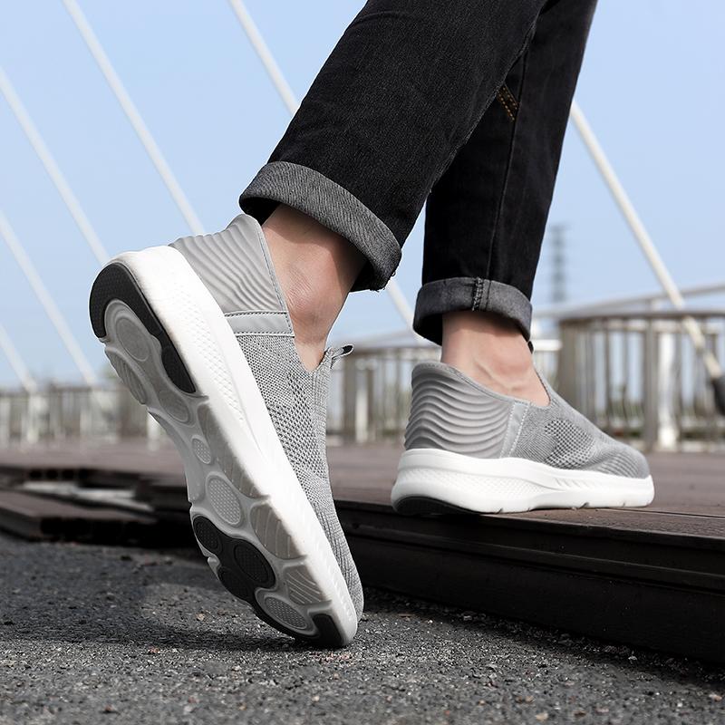 Herrenschuhe ein neuer Slipper Netzschuhe Fliegenstrick Sportschuhe Laufschuhe lässige weiche Sohlen mit allen Modeschuhen