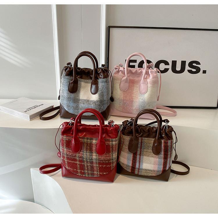 2023 Neue Koreanische Farbblock-Freizeit-Tasche Vintage-Mode Woll-Eimer-Tasche Grenzüberschreitender Trend-Stil