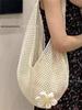 New Style Holiday One-Shoulder Knit Bag: Retro Mesh Hollow Design, Simple Woven Handbag, Exquisite Beach Accessory.