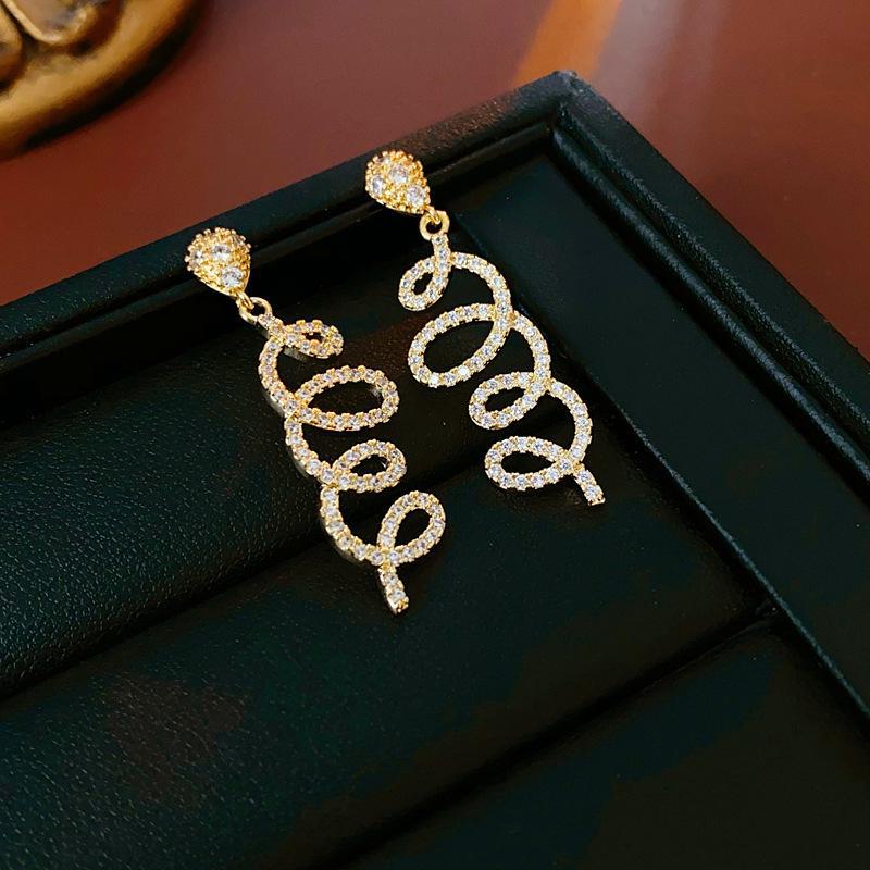 Silver Needle Zircon Water Drop Earrings - Light Luxury, Exquisite, Cold Style, High-End Fashion Statement.