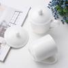 Zhi Shi White Ceramic Cup with Lid and Handle