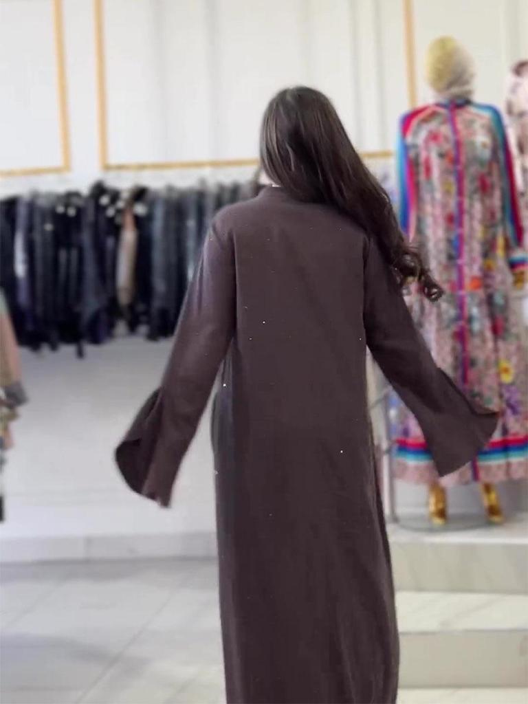 Glitzerndes Langarmkleid mit Rundhalsausschnitt und Bindedetail am Rücken