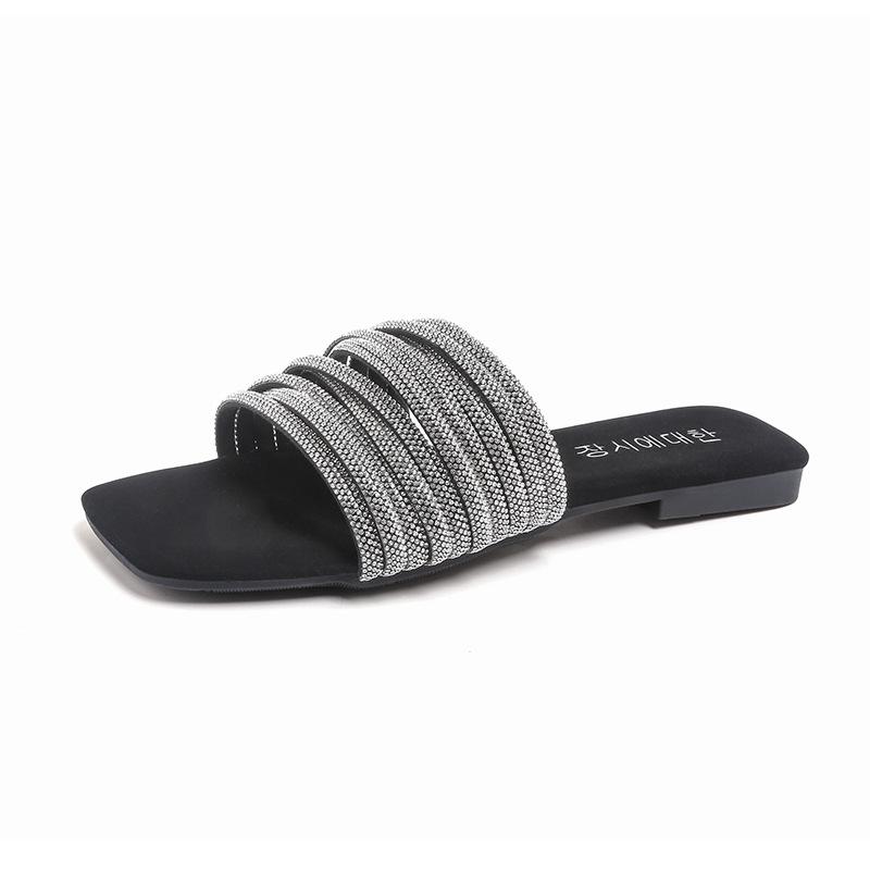 French beautiful flat-bottomed one-word slippers outer wear 2025 summer new high-end skirt casual beach sandals