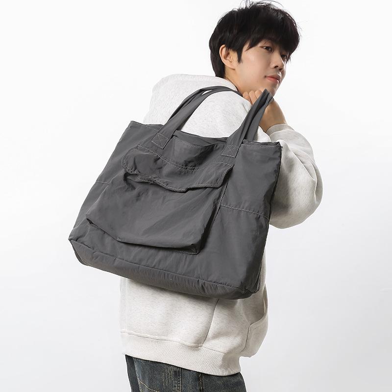 Premium skulderveske Lettvekts tøyveske for menn Anti-sprut fritid Bærbar pendlerveske med stor kapasitet