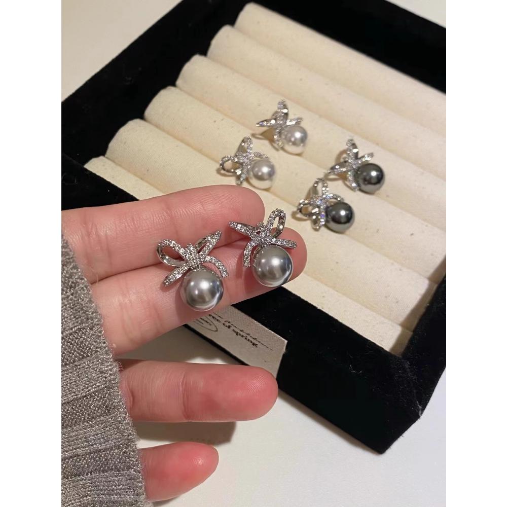 Seiko version earrings, silver needles full of diamonds, bow, Shijia pearl stud earrings, femininity, niche sense, fashionable and high-end earrings.