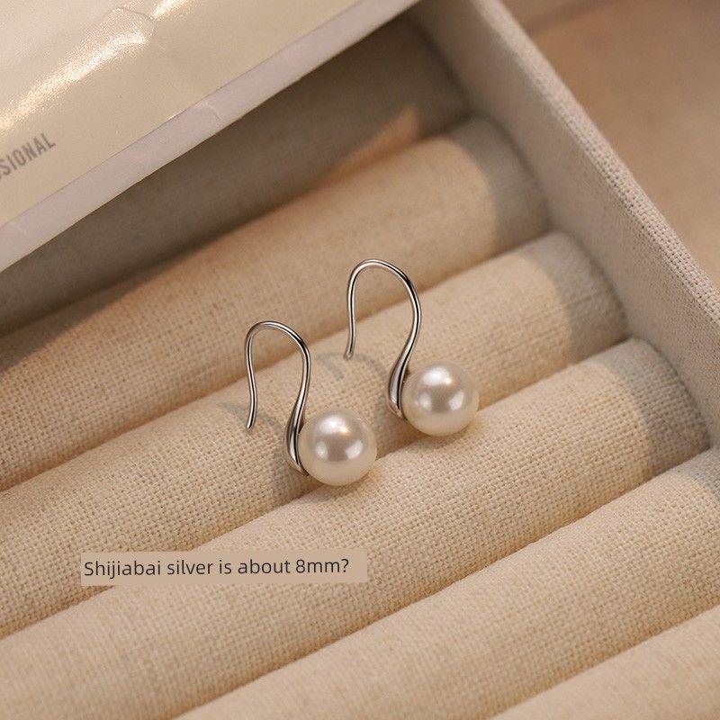 

Xiangnan 925 Sterling Silver Best Selling Niche Style Women s Pearl Earrings 925 Silver Pearl silver Ear Hook 8mm (Two Price)