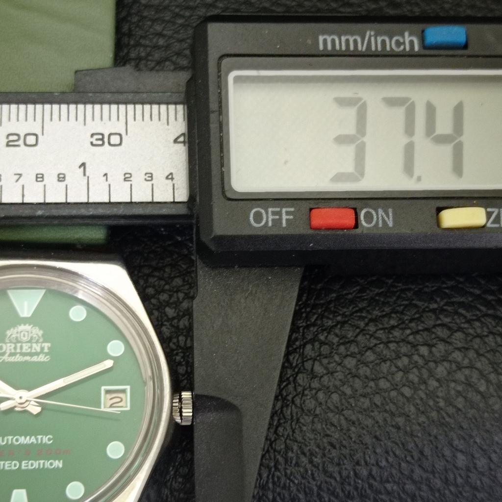 VINTAGE ORIENT AUTOMATIC 46941 JAPAN MENS GREEN COLOR DIAL WATCH a701806-5 R207-a701806