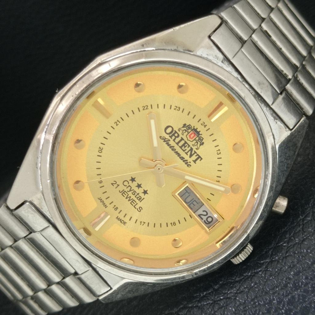 

GENUINE VINTAGE ORIENT CRYSTAL AUTOMATIC JAPAN MENS GOLDEN DIAL WATCH a706961-1