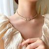 French Retro Camellia Pearl Necklace with Asymmetrical Rhinestone Chain – Elegant Neck Accessory
