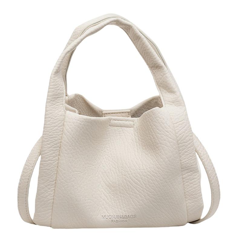 High-end hand-held bucket bag women's new 2025 trendy fashion shoulder bag niche simple casual crossbody bag