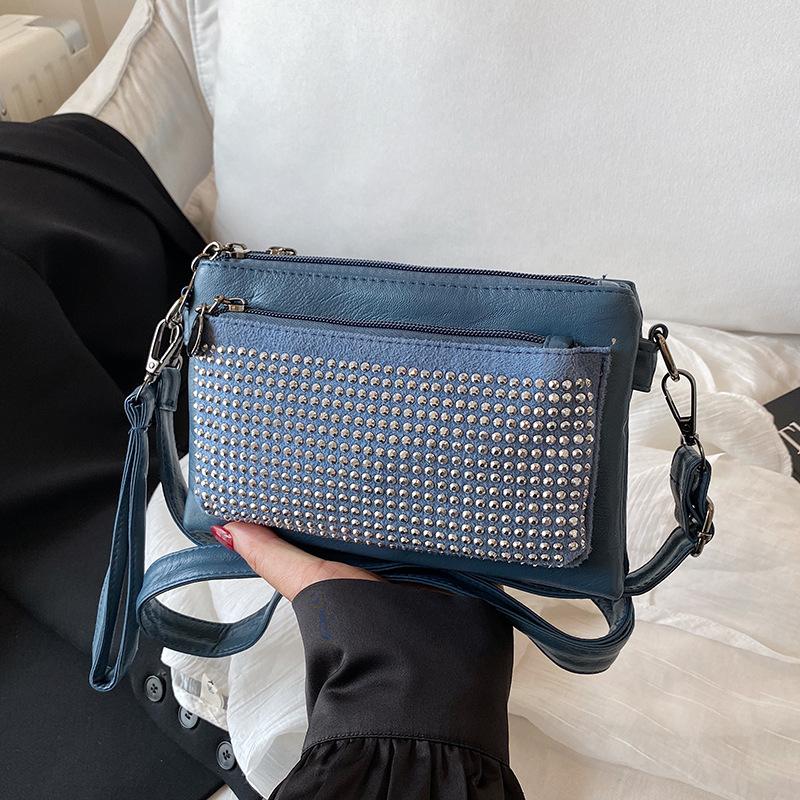 Rivet decoration large capacity high quality soft durable fashion exquisite lightweight commuting outdoor crossbody bag shoulder bag