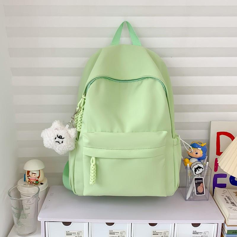 Schoolbag simple solid color schoolbag female Japanese large-capacity backpack junior high school student college student lightweight backpack 