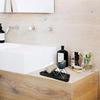 Practical Bathroom Solution with Stainless Steel Soap Rack and Drainage Feature