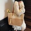Summer new single shoulder hollow straw woven bag foreign fashion fringed woven bag vacation wind beach bag contrasting color straw bag