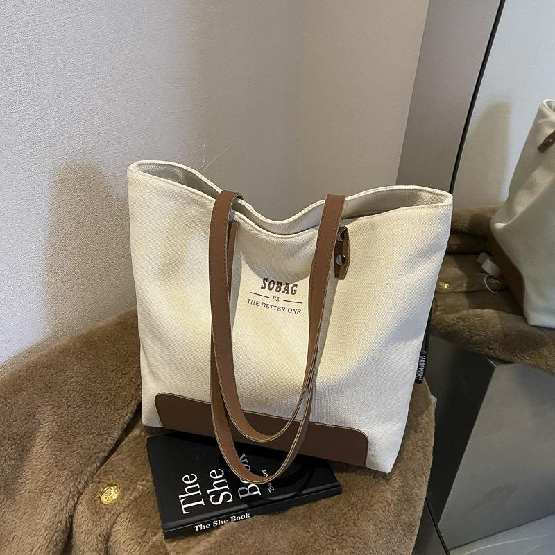 Original design simple high-end commuter canvas tote literary and casual versatile student portable shoulder bag