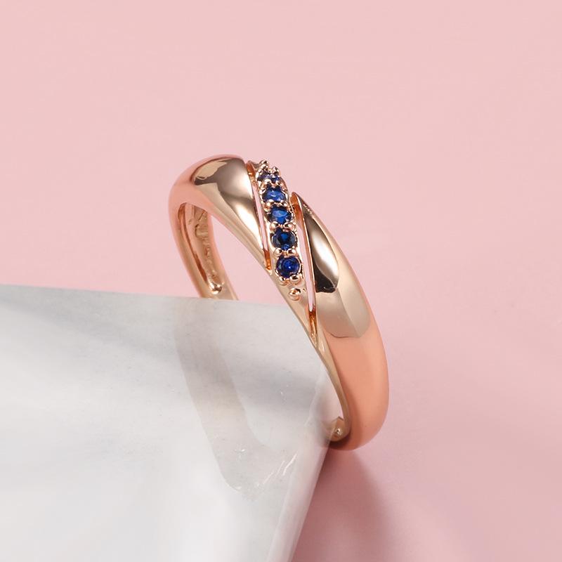 European & American Fashion: Copper Zircon Ring with Minimalist Diagonal Sapphire Design