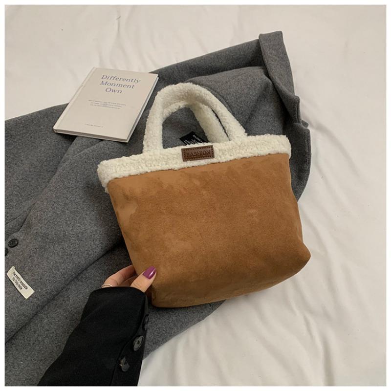 Niche Plush Hand Carrying Bucket Bag Women's Autumn and Winter New Retro Commuting Small Bag