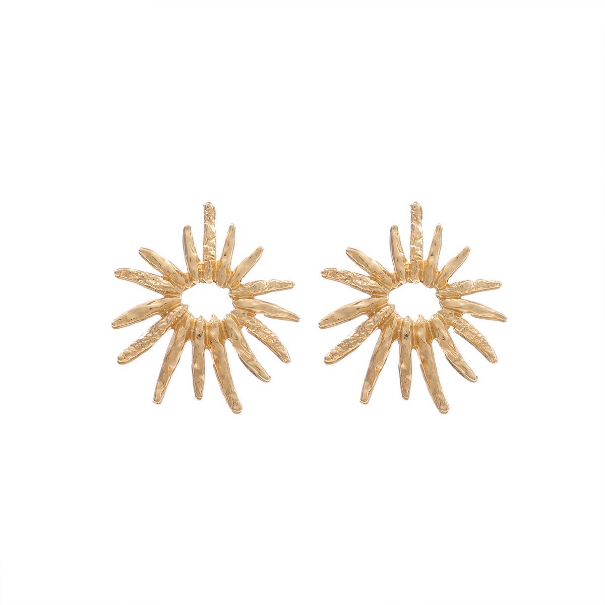 Alloy hollow sunflower retro artistic earrings with exaggerated European and American design, fashionable and exaggerated women