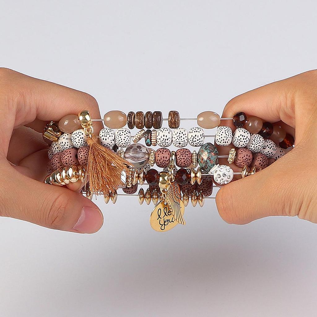 Bohemian Trendy Bracelet with Wings, 'I Love You' Tassel Pendant, and Retro Creative Design