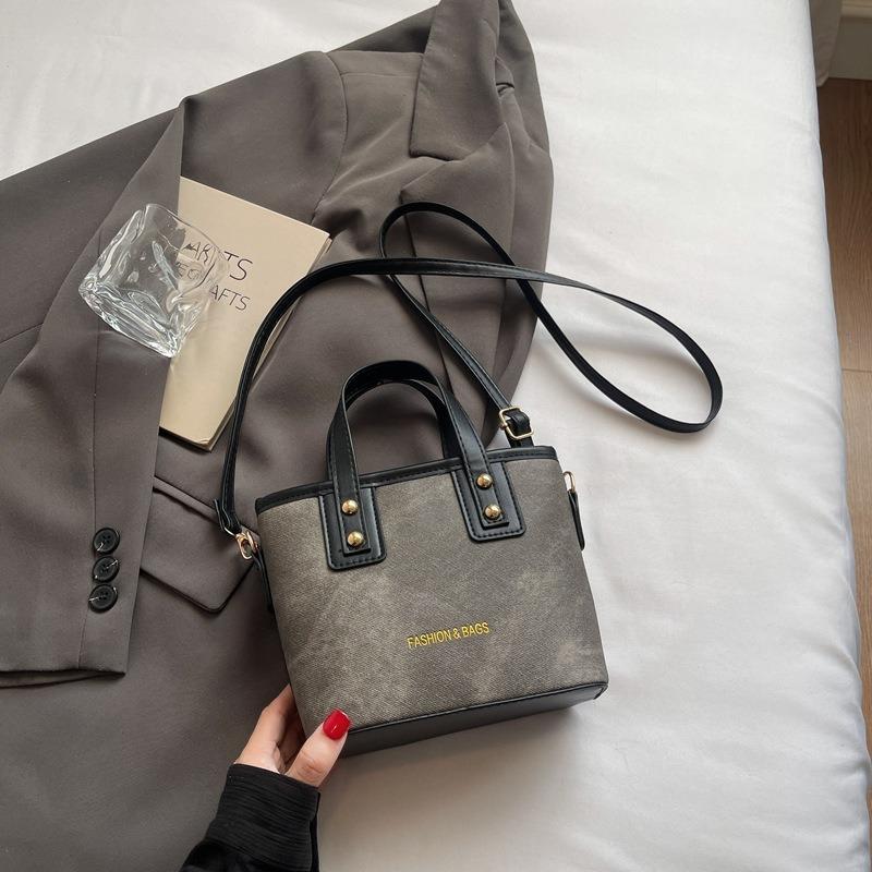 High-end Light Luxury Small Bag Women's New Versatile Messenger Bag Niche Unpopular Portable Bucket Bag Women