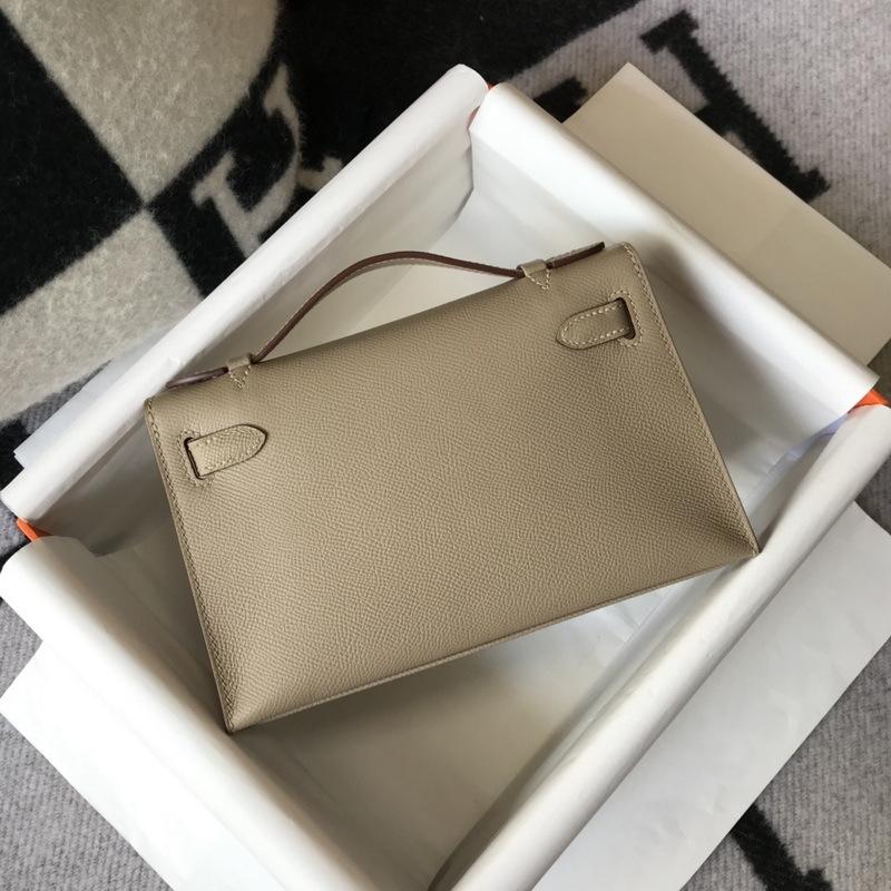 Nuova borsa da donna in vera pelle, mini generazione, alla moda, portatile, con palmo in pelle bovina di primo strato, 22 cm