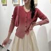 Niche senior sense V-neck exposed clavicle irregular top women's pink gradual change color knitted sweater women's age-reducing commute
