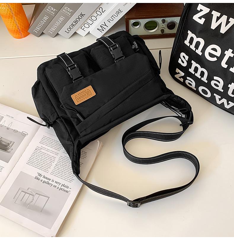 Schoolbag women's messenger bag tide brand ins tooling style Japanese casual men's bag large capacity shoulder bag personalized mailman bag tide