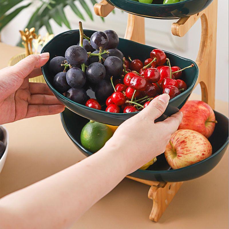 Wind Kreative Dreischichtige Trockenobstplatte Neuer Bambus- und Holzrahmen Mehrschichtige Snackplatte Haushalt Wohnzimmer Einfache Frucht Tang Xin