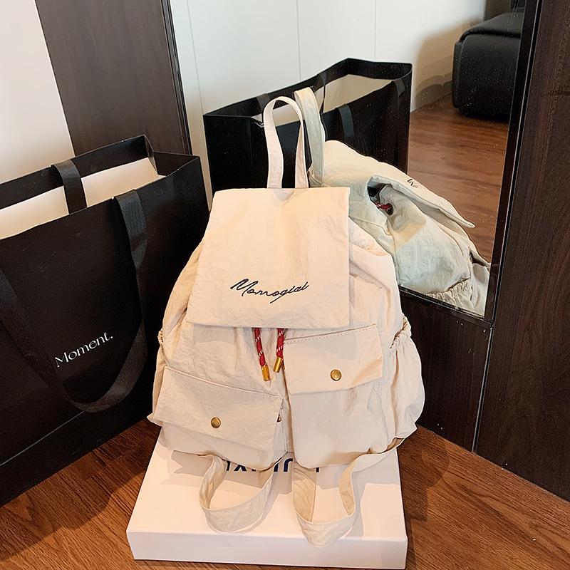 New Korean version of student schoolbag women's high-value commuter travel bag solid color large-capacity casual backpack women