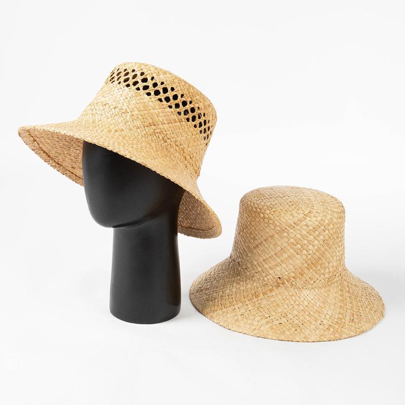 2025 New Arrival Hand-made Hollow Raffia Sun Hat Spring and Summer Fashion Retro Flat Top Outdoor Sunshade Straw Hat Bucket Hat