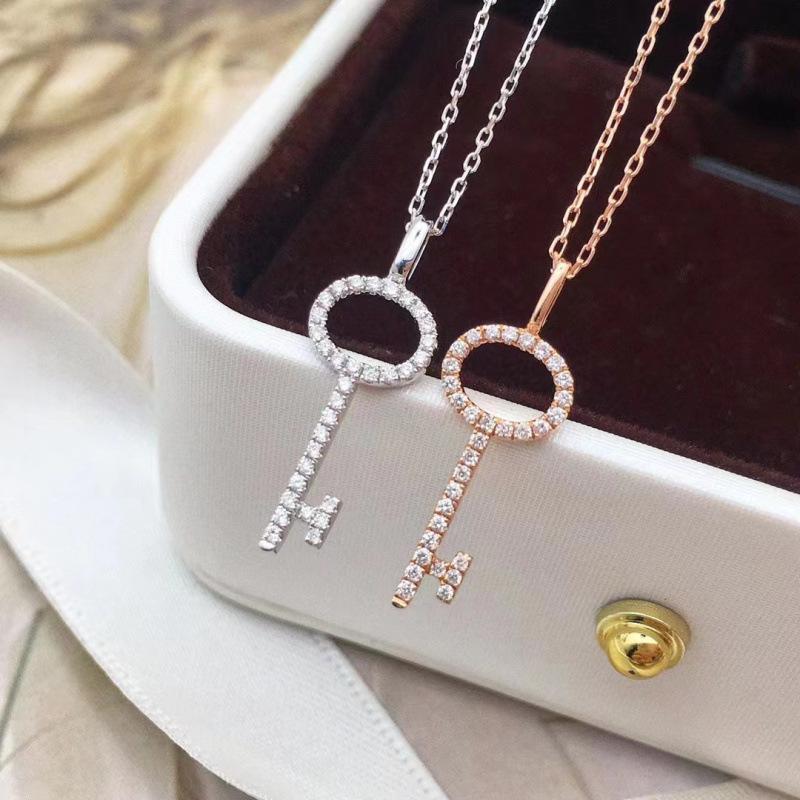 Ethereal Rhinestone Hollow Key Necklace for Women - Designer, Simple, Light Luxury, Ins Style Collarbone Chain.