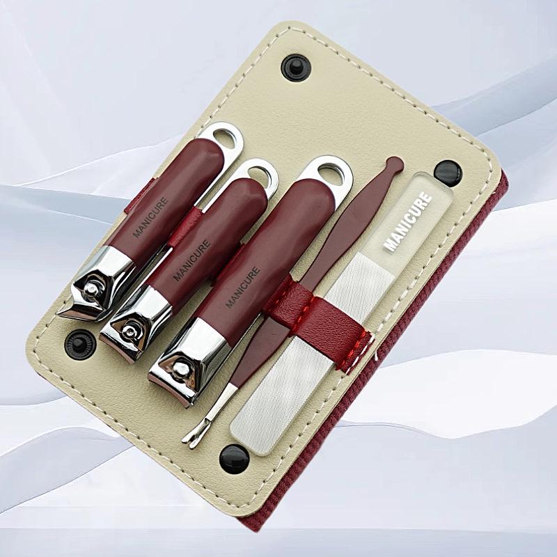 Stainless Steel Manicure Set: Nail Clippers, Cuticle Pusher, Ear Pick, File.