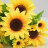 13 sunflowers in total, 4 large and 9 small