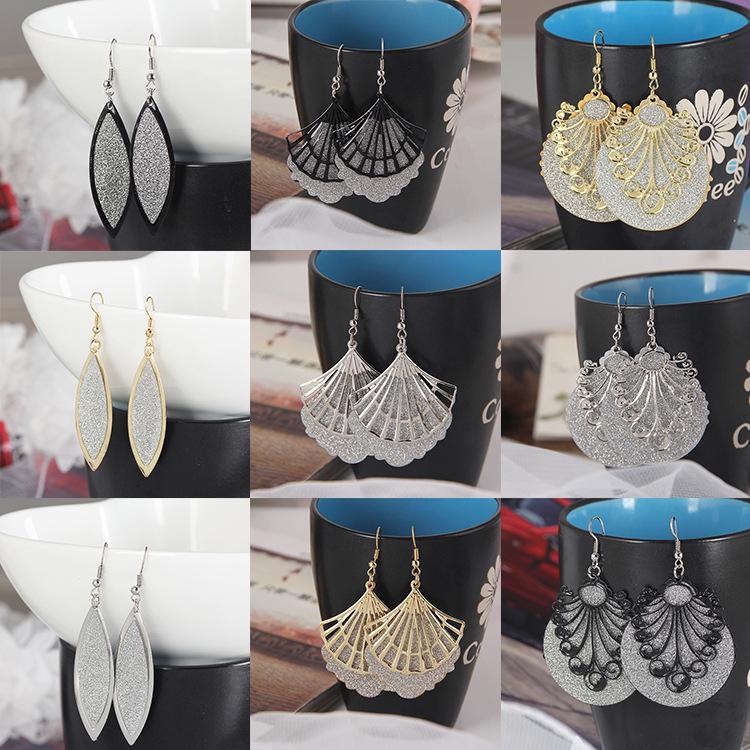 Frosted Geometric Leaf Tassel Earrings - Creative Hollow Round Design