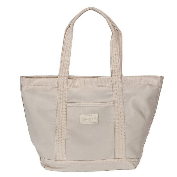 Spacious Nylon Canvas Tote Bag For Women Stylish Commuter Handheld Bag In Black And Cream