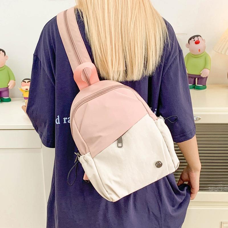 Niche design contrasting color backpack women's new lightweight fashion student bag multifunctional backpack breast bag