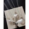 Summer's Choice: Korean Silver Flower Heart Beaded Necklace – Niche Design, Versatile Women’s Pendant Accessory.