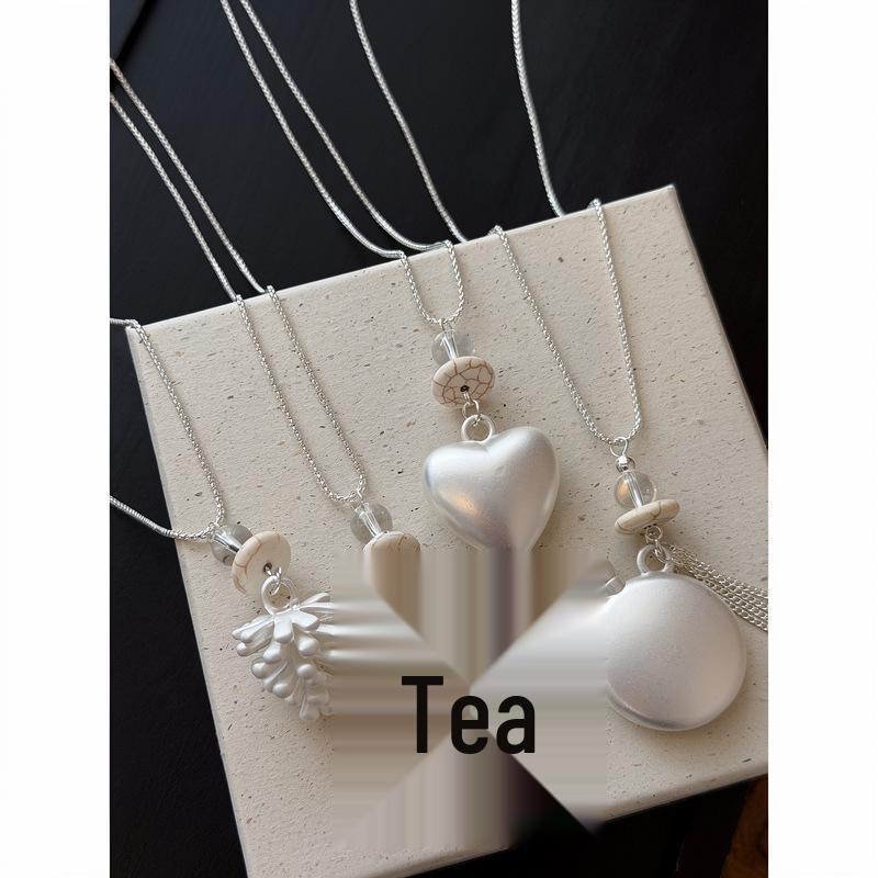 Summer's Choice: Korean Silver Flower Heart Beaded Necklace – Niche Design, Versatile Women’s Pendant Accessory.