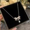 Trendy Titanium Steel Copper Inlaid Graff Bow Necklace: High-End Clavicle Chain Accessory for Women