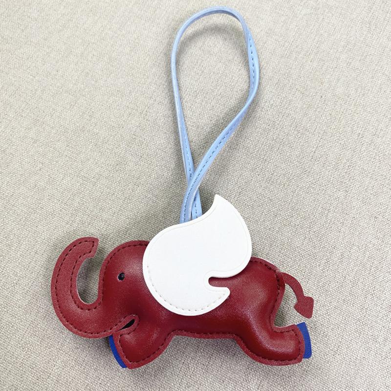 Trendiger Designer PU Leder Flügel Fliegender Elefant Aufhänger Schlüsselanhänger Anhänger Dekoration für Damen Taschenanhänger Accessoires Ornament Geschenke