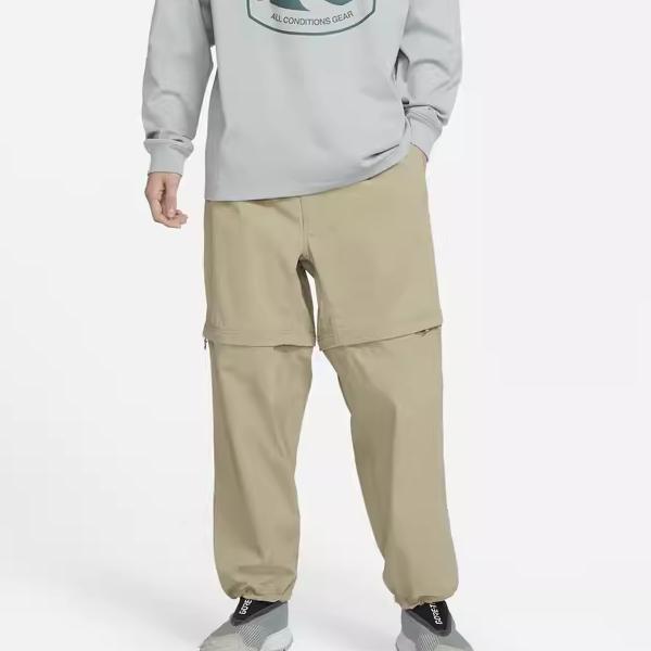 Nike ACG Ensfarvet Logo Avtakbar 2-i-1 Sportsbukser Herre Underdeler Olivengrønn DX6647-276