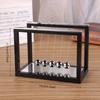 Premium resin Newton cradle sculpture,sleek black frame decor,power-free swing ornament for indoor outdoor display,modern craft for home,office layout