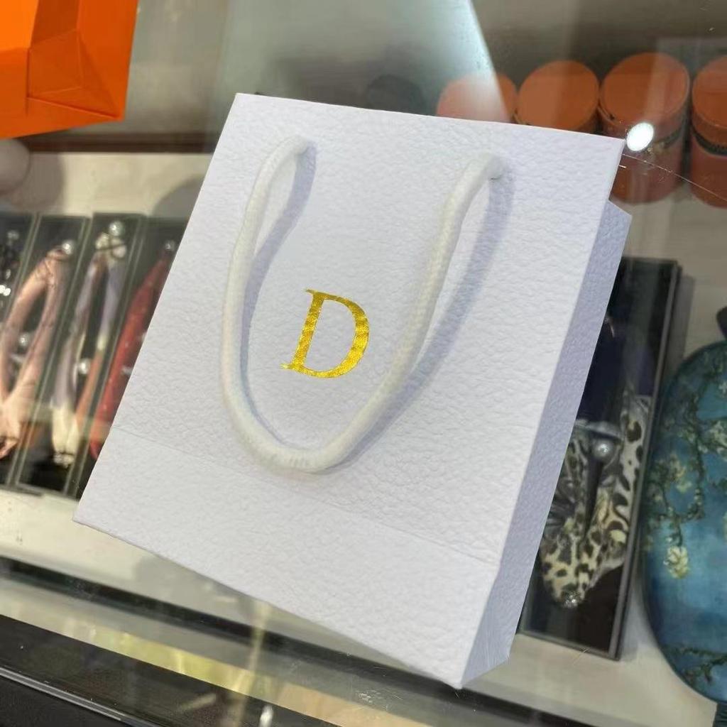 Exquisitely Decorated Orange Round Gift Box with Ribbon Neckerchief